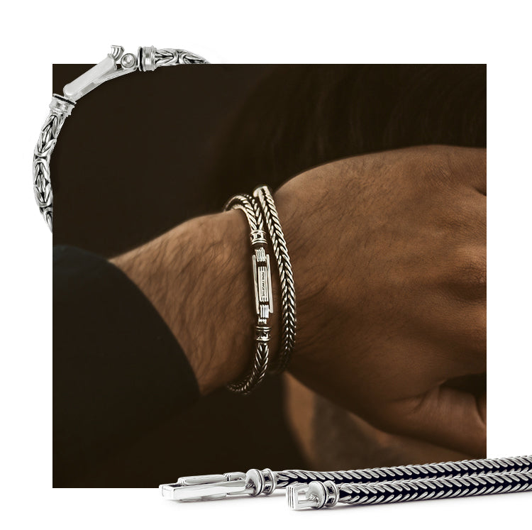 Man wearing byzantine and braided bracelets with mens silver rings from Ninetwofive.
