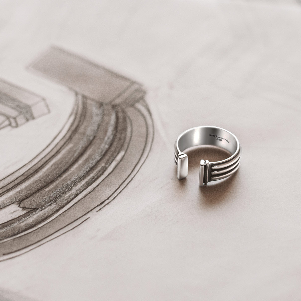 Adjustable and engraved silver rings for men