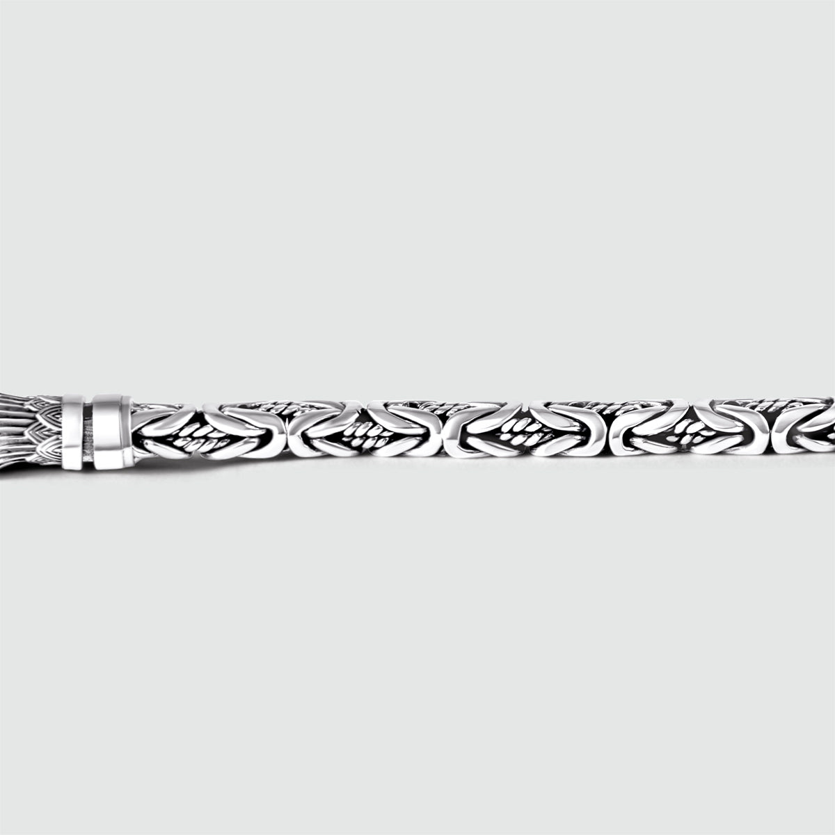 Detailed side view of personalised mens silver Byzantine bracelet murtaza