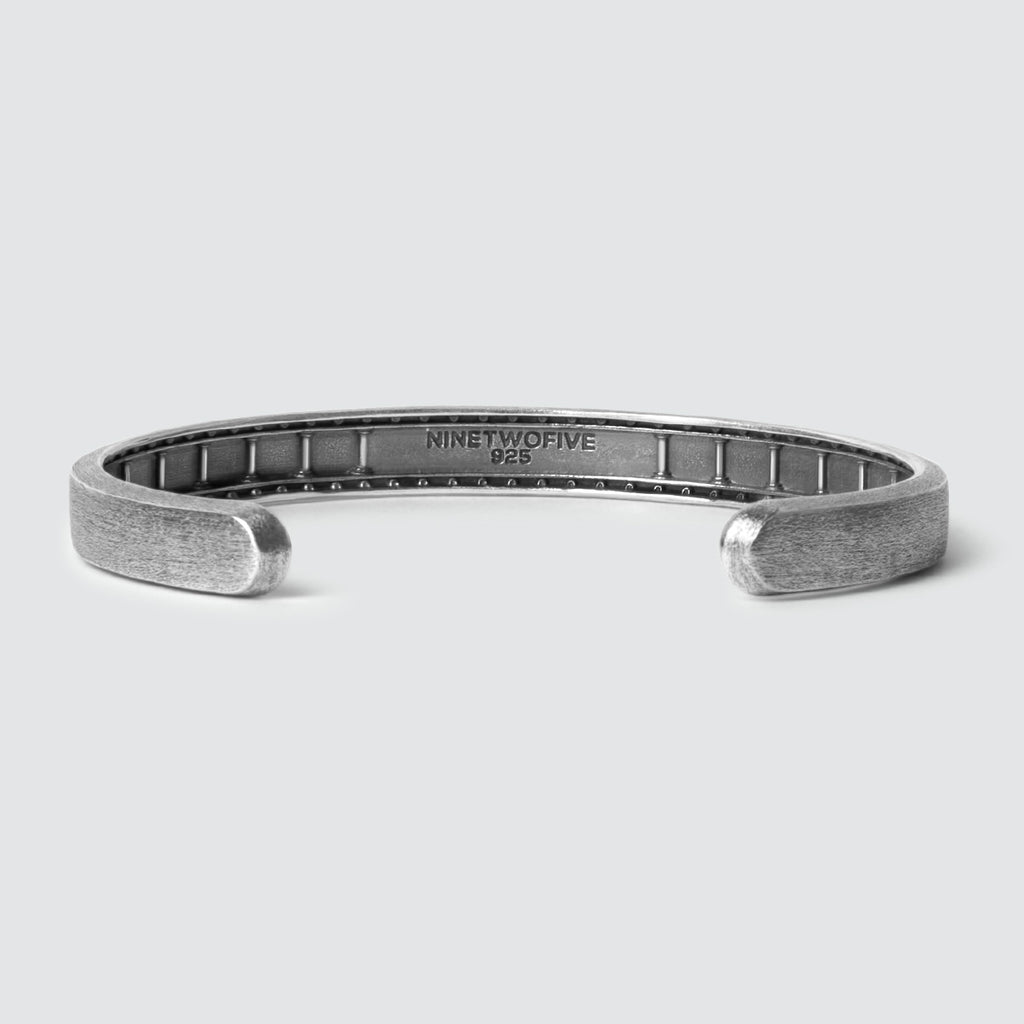 Description: A Fudail - Rough Brushed Sterling Silver Bangle 8mm on a white background, perfect for men.