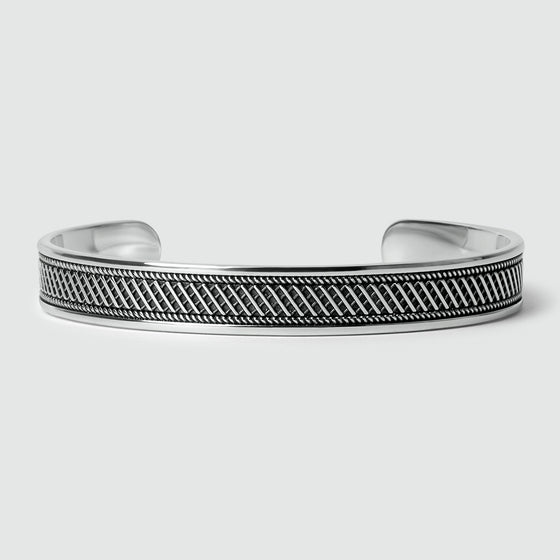 Front view of Kaliq oxidized sterling silver mens bracelet from Ninetwofive with a black and white pattern.