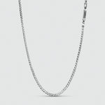 A handmade Emir - Sterling Silver Minimalist Necklace 2.5mm on a white background.