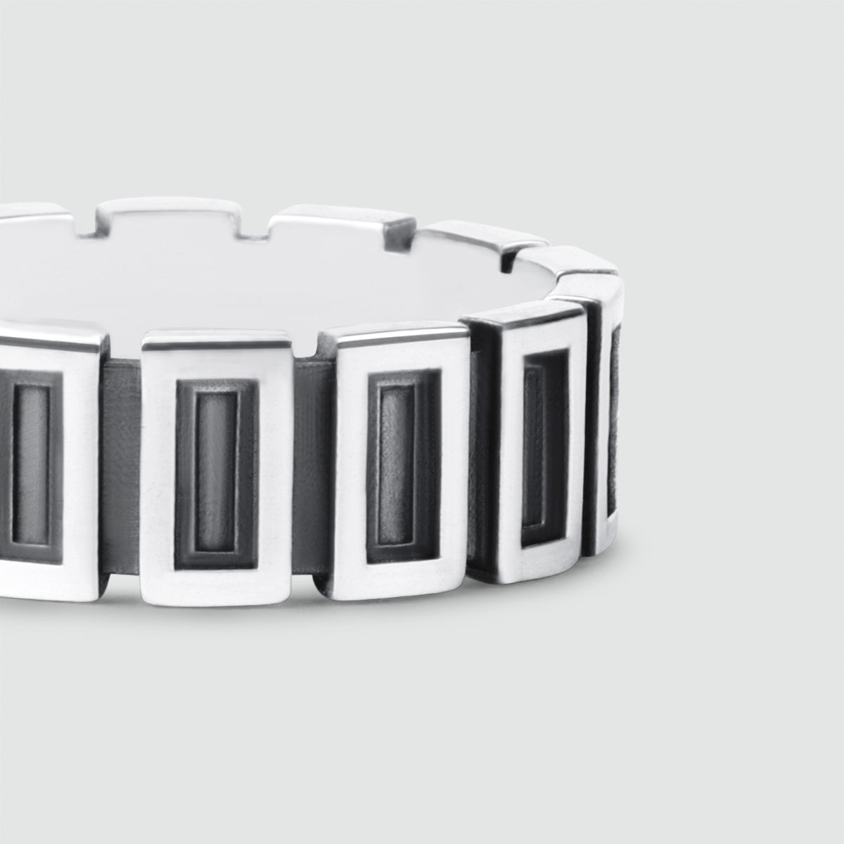 A Yardan - Oxidized Sterling Silver Ring 8mm with black and white squares.