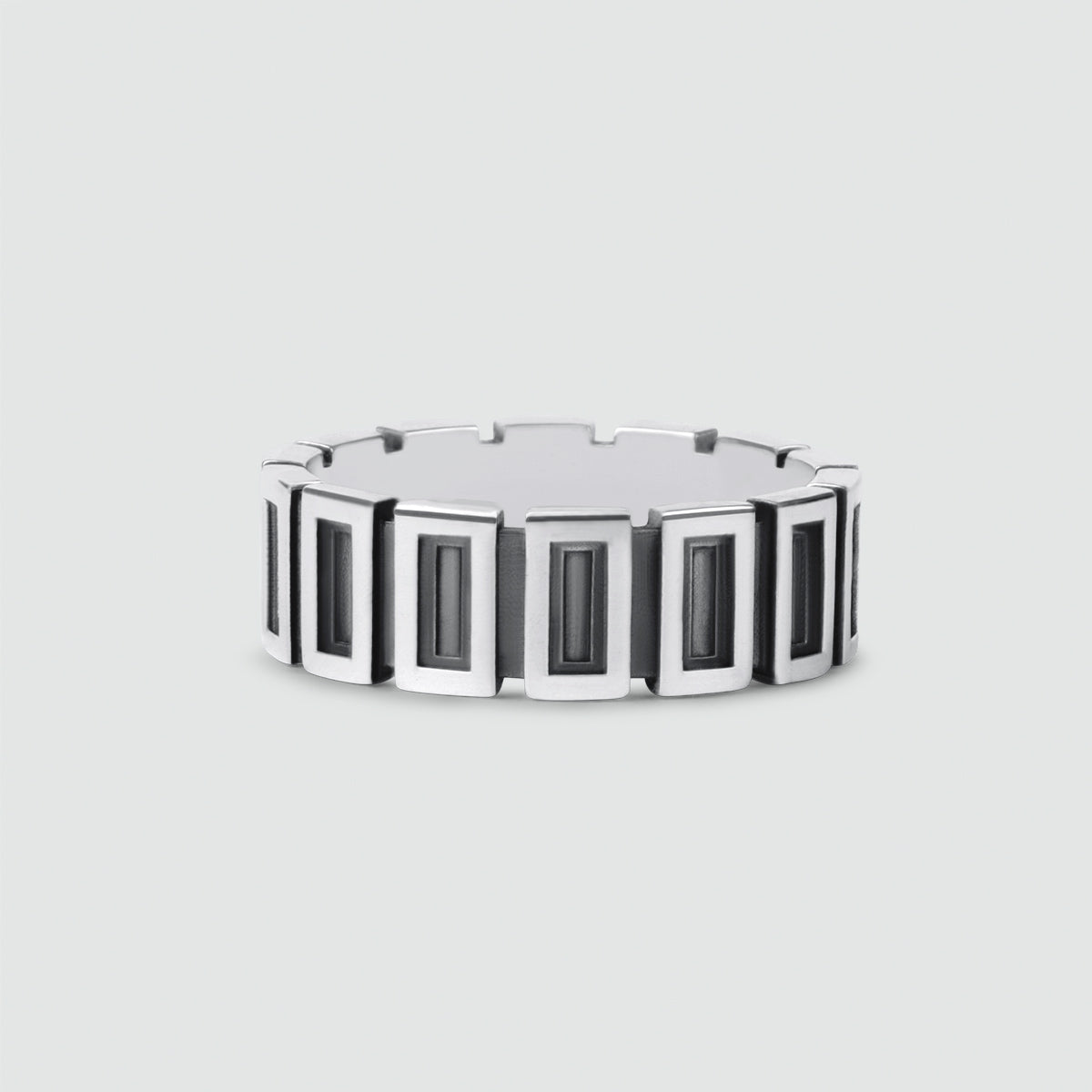 A Yardan - Oxidized Sterling Silver Ring 8mm with engraved black and white stones.