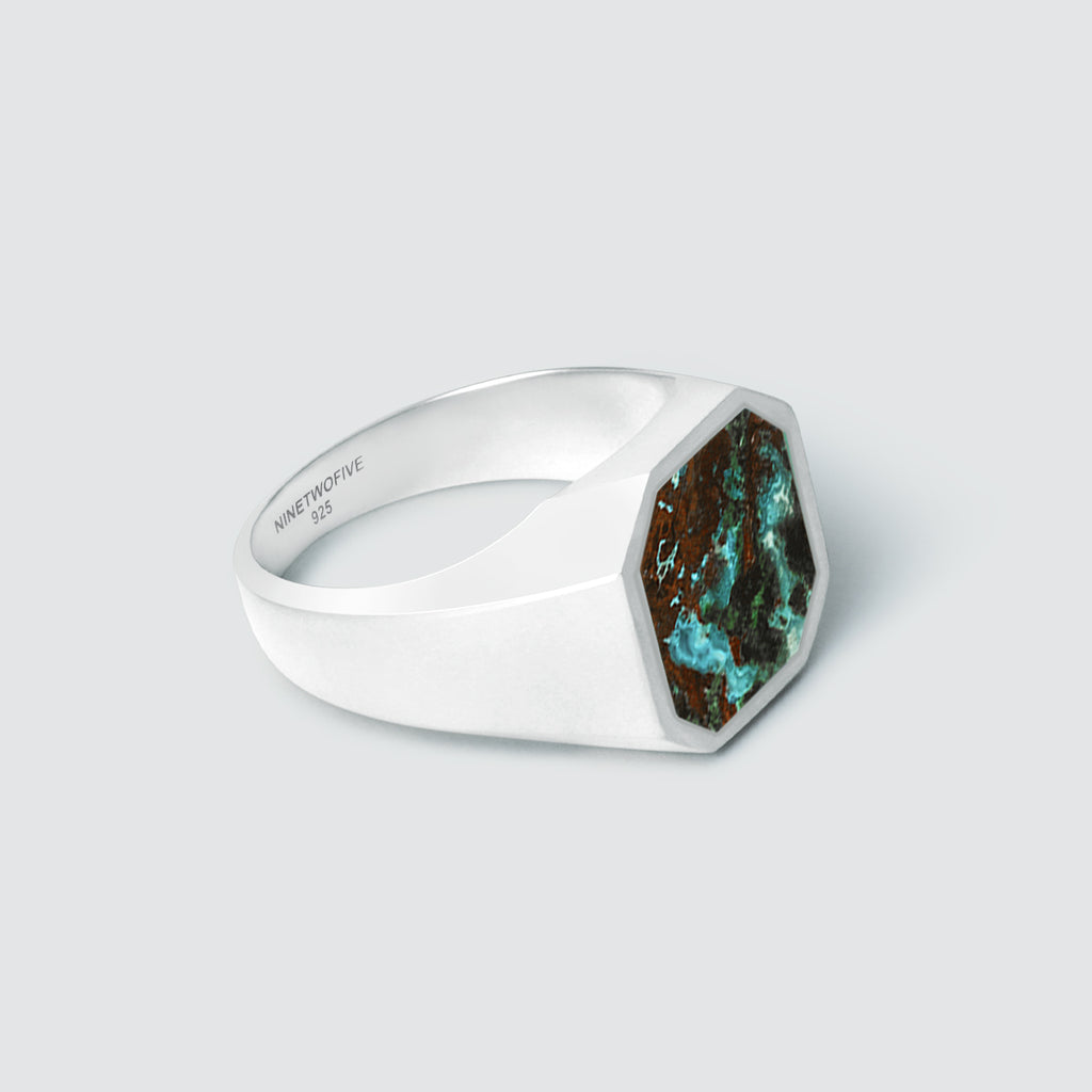 An engraved Zaire - Sterling Silver Azurite Signet Ring 13mm with a turquoise stone.
