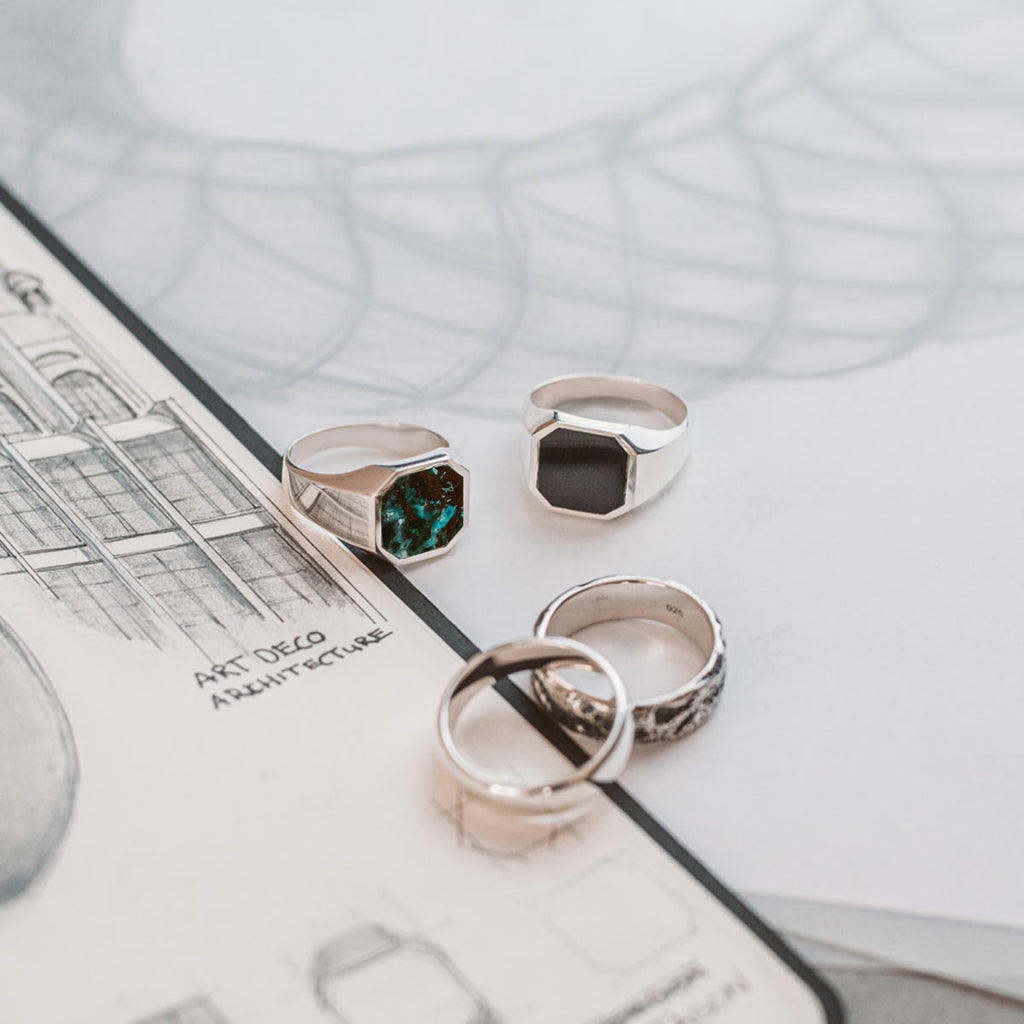 A sketch and a drawing of a ring.