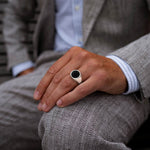 Man wearing Adil sterling silver black onyx mens signet ring from Ninetwofive.