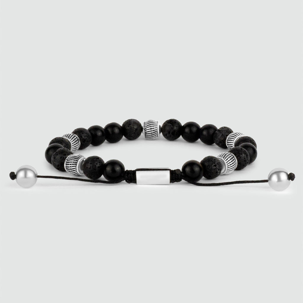 A Kaliq - Adjustable Onyx Black Beaded Bracelet in Silver 8mm adorned with black onyx and 8mm silver beads.