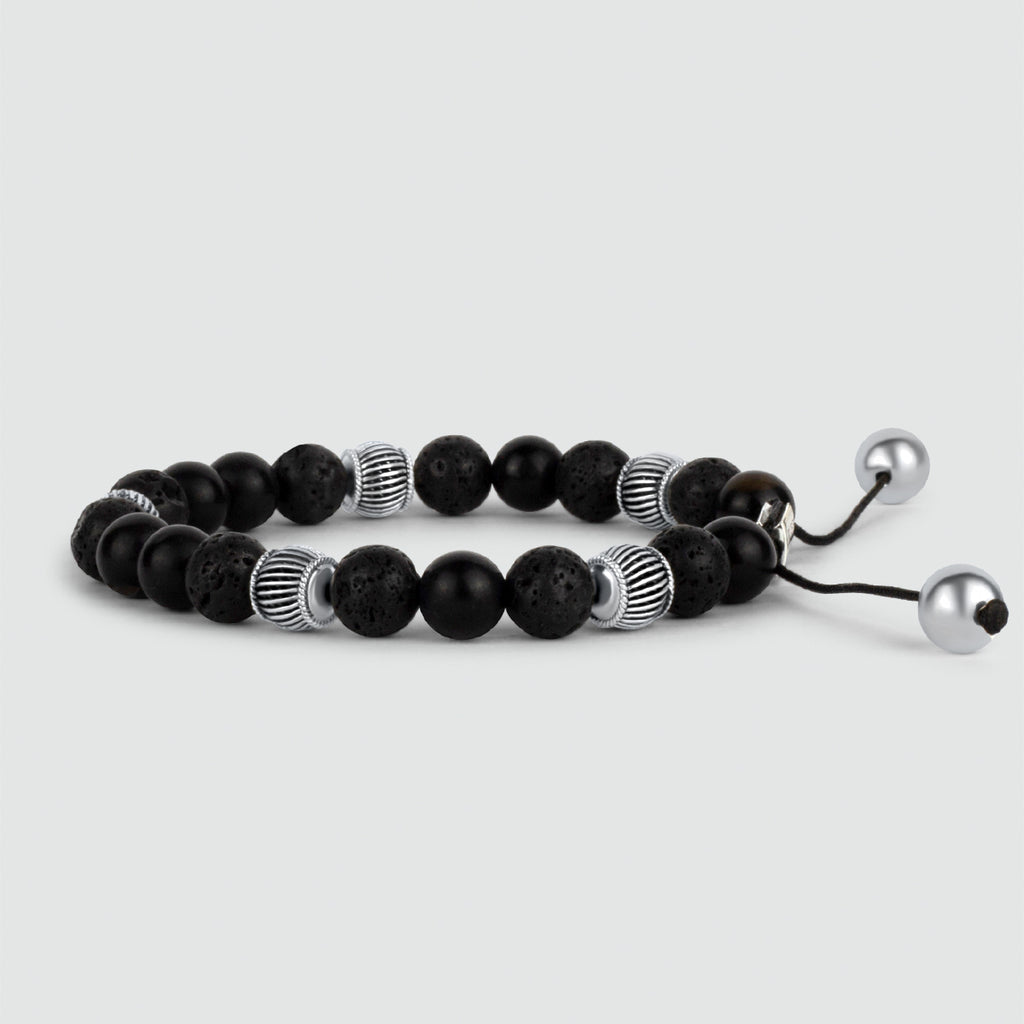 A Kaliq - Adjustable Onyx Black Beaded Bracelet in Silver 8mm adorned with 8mm black onyx beads.