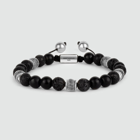 https://ninetwofive.com/cdn/shop/files/black-and-silver-beaded-bracelet-8mm-front-view-product-photo-1-NineTwoFiv.jpg?v=1700031949&width=533