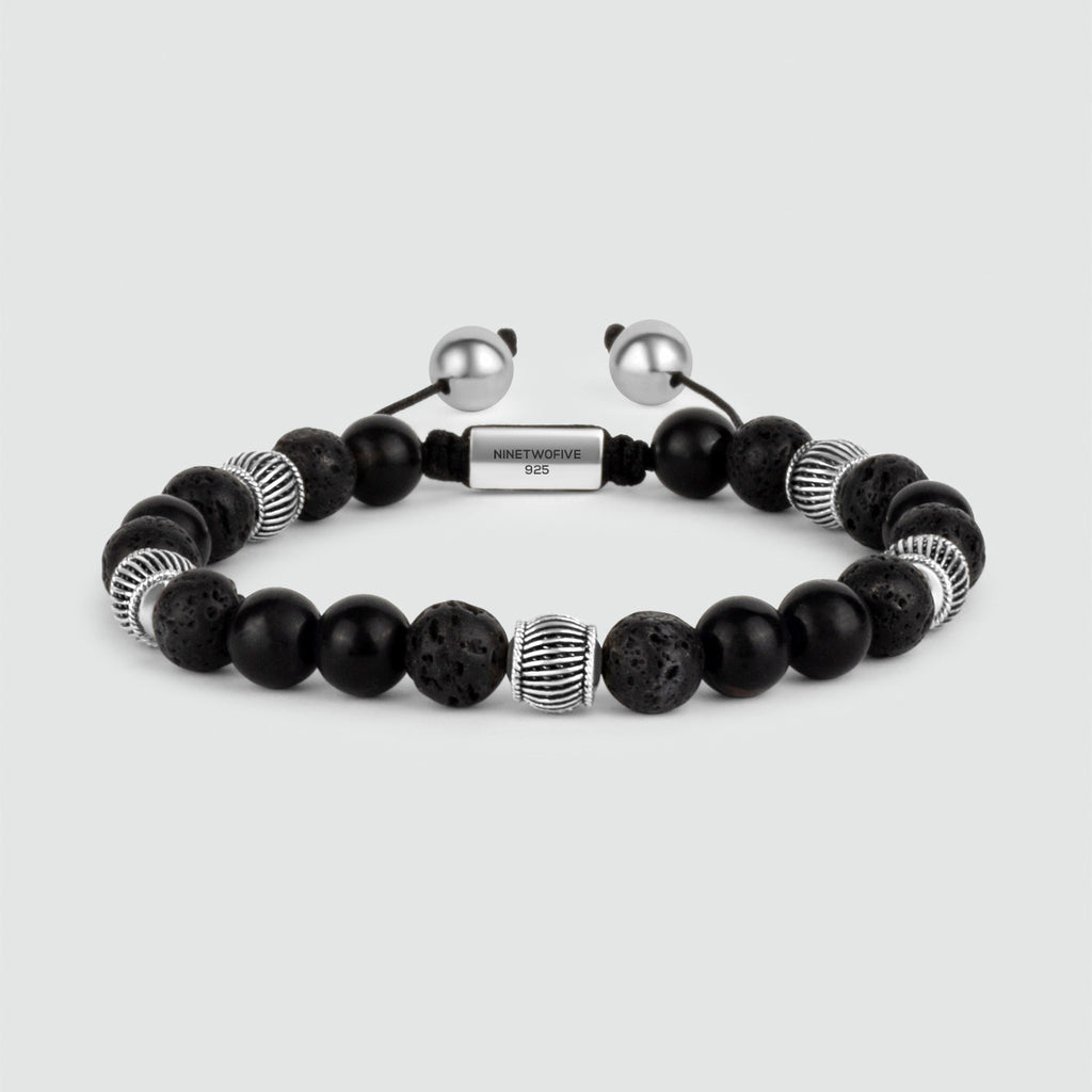 The Kaliq - Adjustable Onyx Black Beaded Bracelet in Silver 8mm is adorned with black onyx beads.