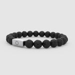 side detail of the black lava stone men's bracelet with Ninetwofive logo in front.