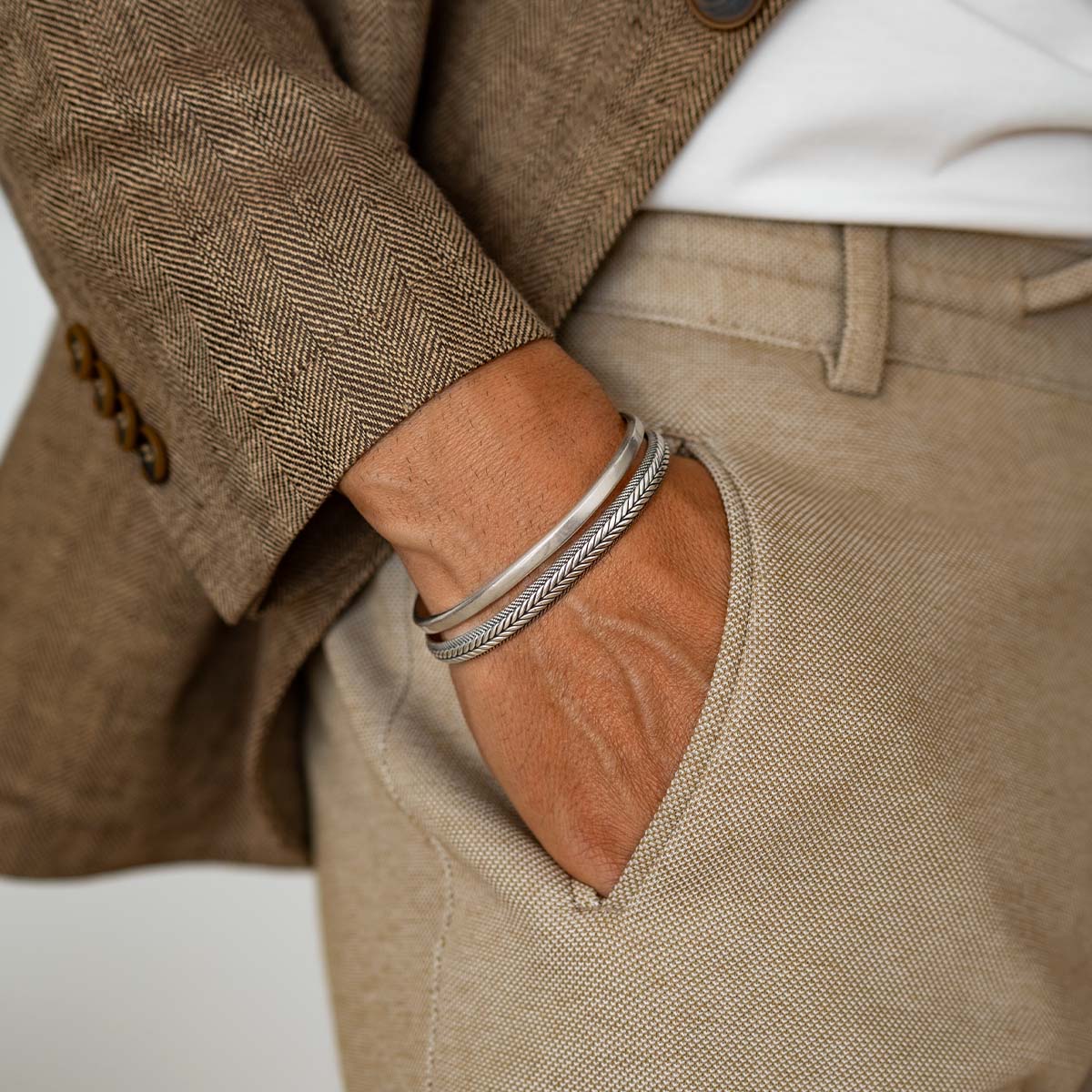 Idris - Braided Silver Bangle Bracelet 8mm styled with a plain silver bracelet, worn with a suit