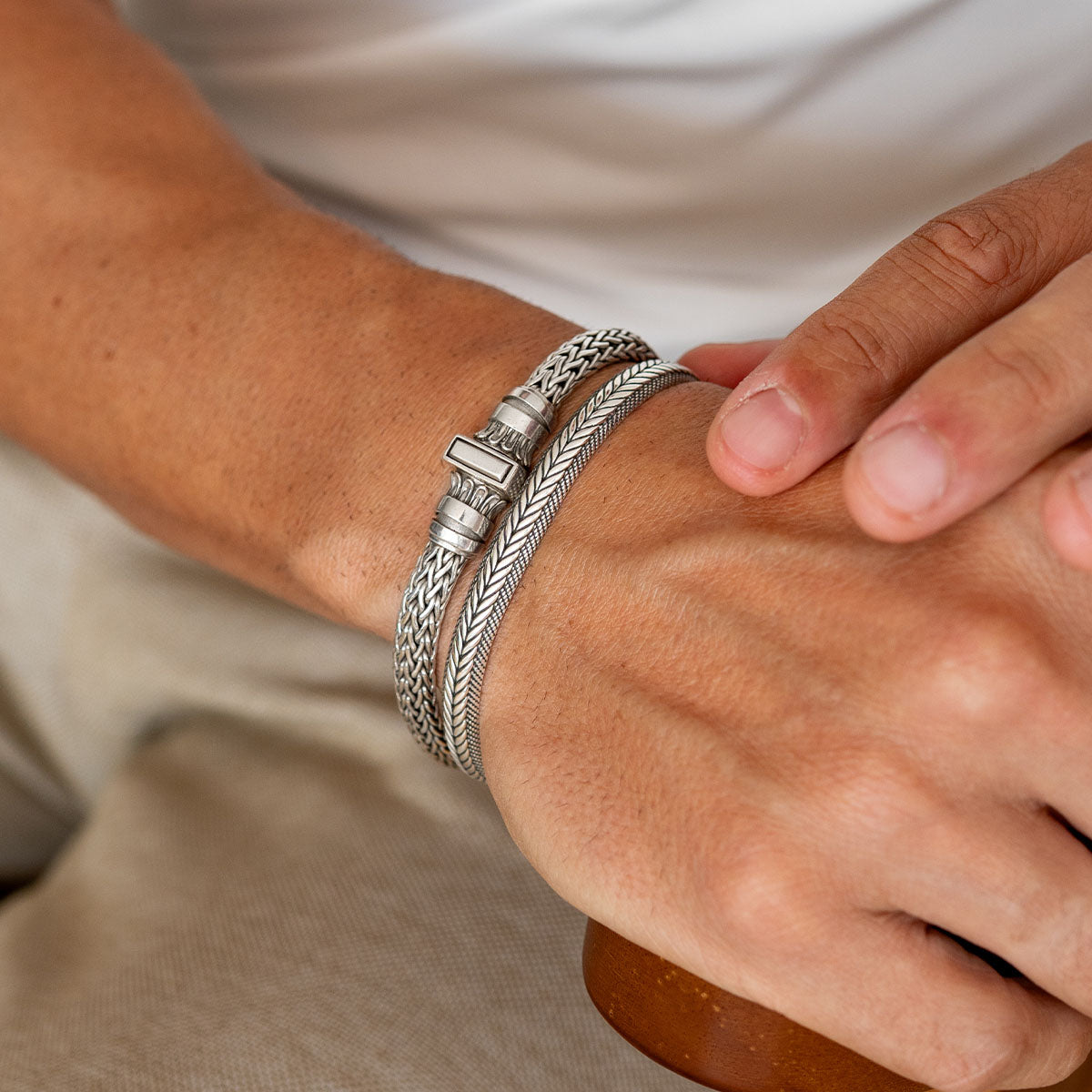 Idris - Braided Silver Bangle Bracelet 8mm styled with a woven silver bracelet