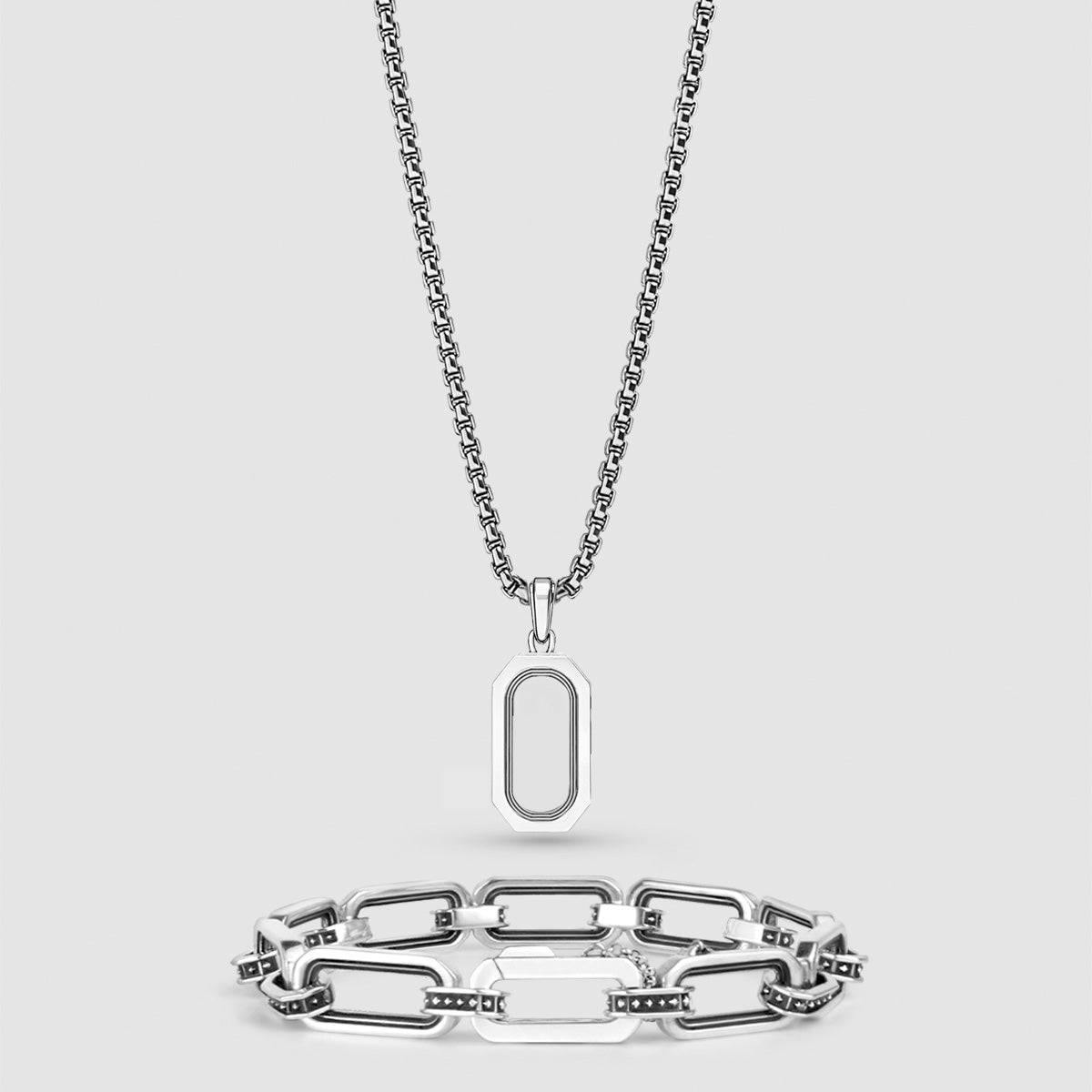 Durwas zilveren hanger en aqwas heren armband ontworpen uit zwarte diamanten vormen samen een perfecte zilveren set. 