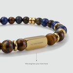 Close-up of the gold-coloured bar on the Halloween Treat bracelet, showing where the engraving goes