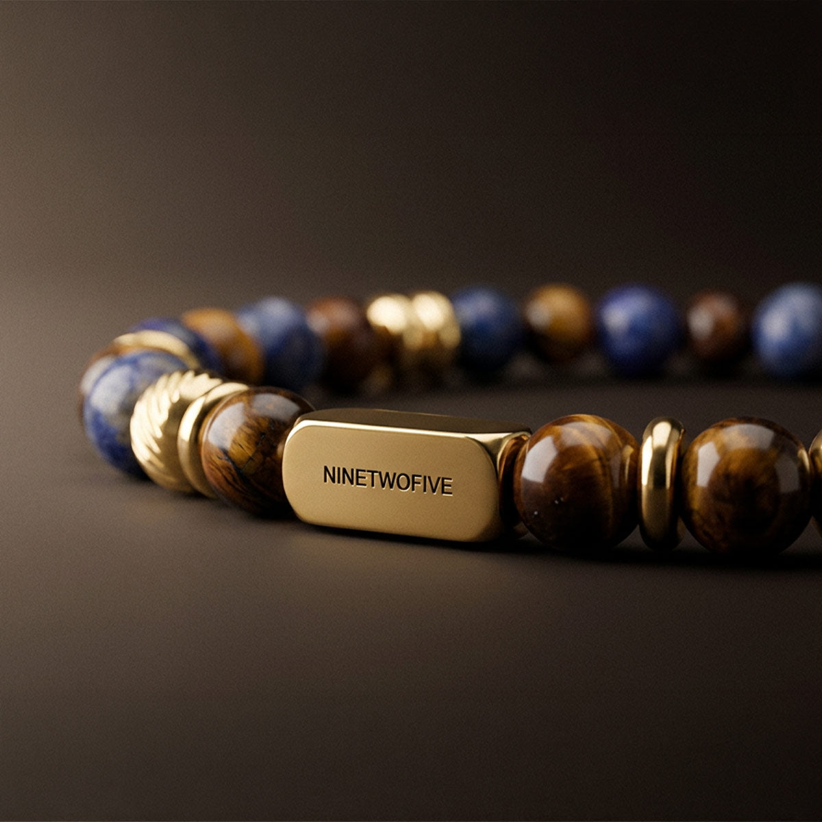 Mood shot of the Halloween Treat tiger eye and blue lace agate bracelet