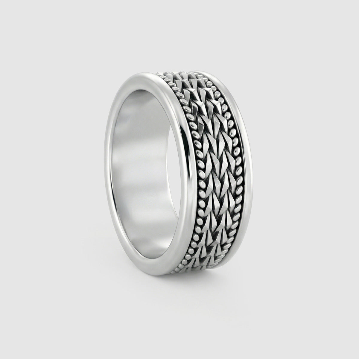 hidan mens 925 silver band ring Ninetwofive showcasing polished edges and detailed braided center for a jewellery trend.