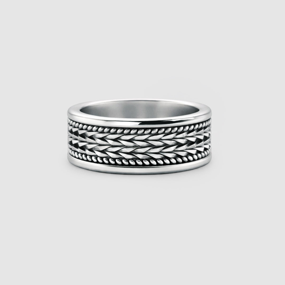 hidan sterling silver spinner ring mens trends Ninetwofive with braided center detail on white background.