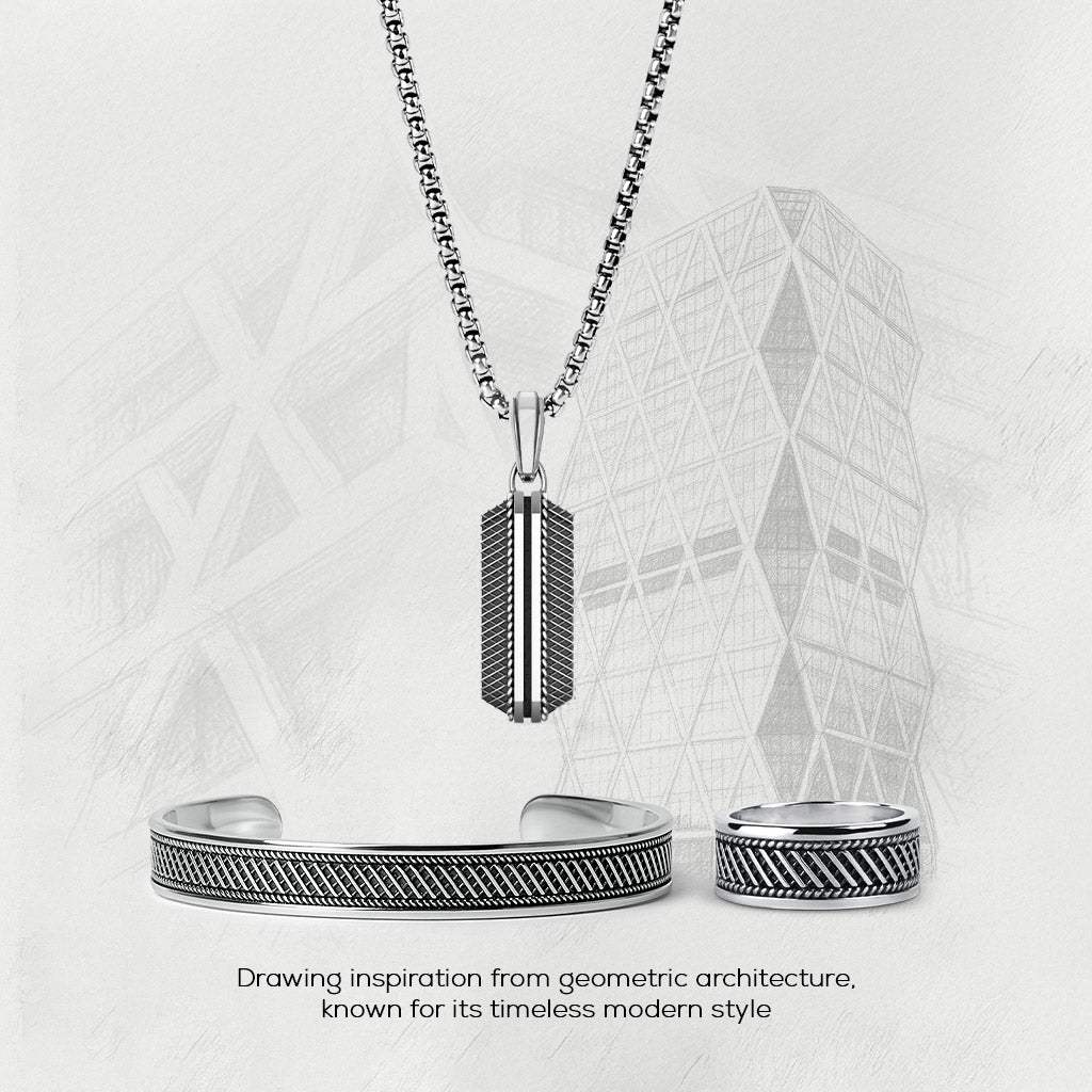 Kaliq oxidised sterling silver pendant, ring, and bracelet with Berlin 50Hertz sketch background.