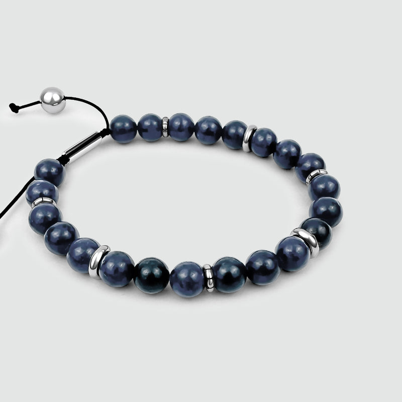 Top side view of Kadar mens bracelet with white perls, and blue and silver beads by Ninetwofive.