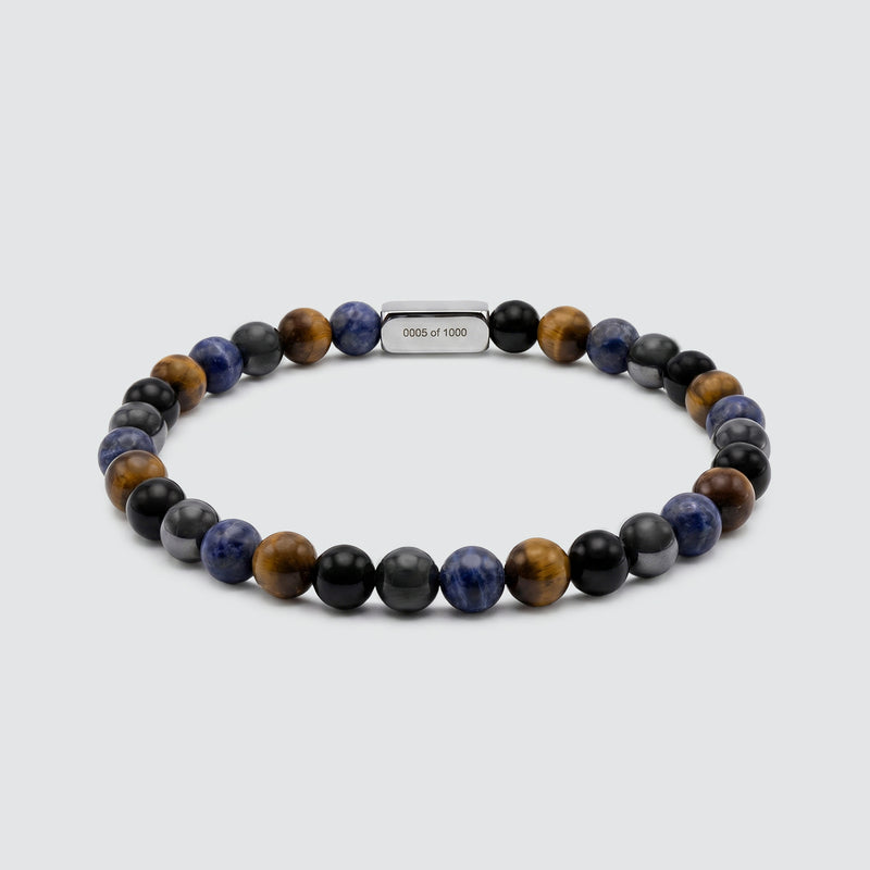 Limited edition heren armband met kralen van tijgeroog, zwarte agaat en blauwe steen