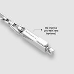 Close-up of the Qaws mens sterling silver link chain by Ninetwofive, showing the area available for free engrave.