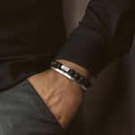 man wearing lava stone bracelet and silver bangle from Ninetwofive