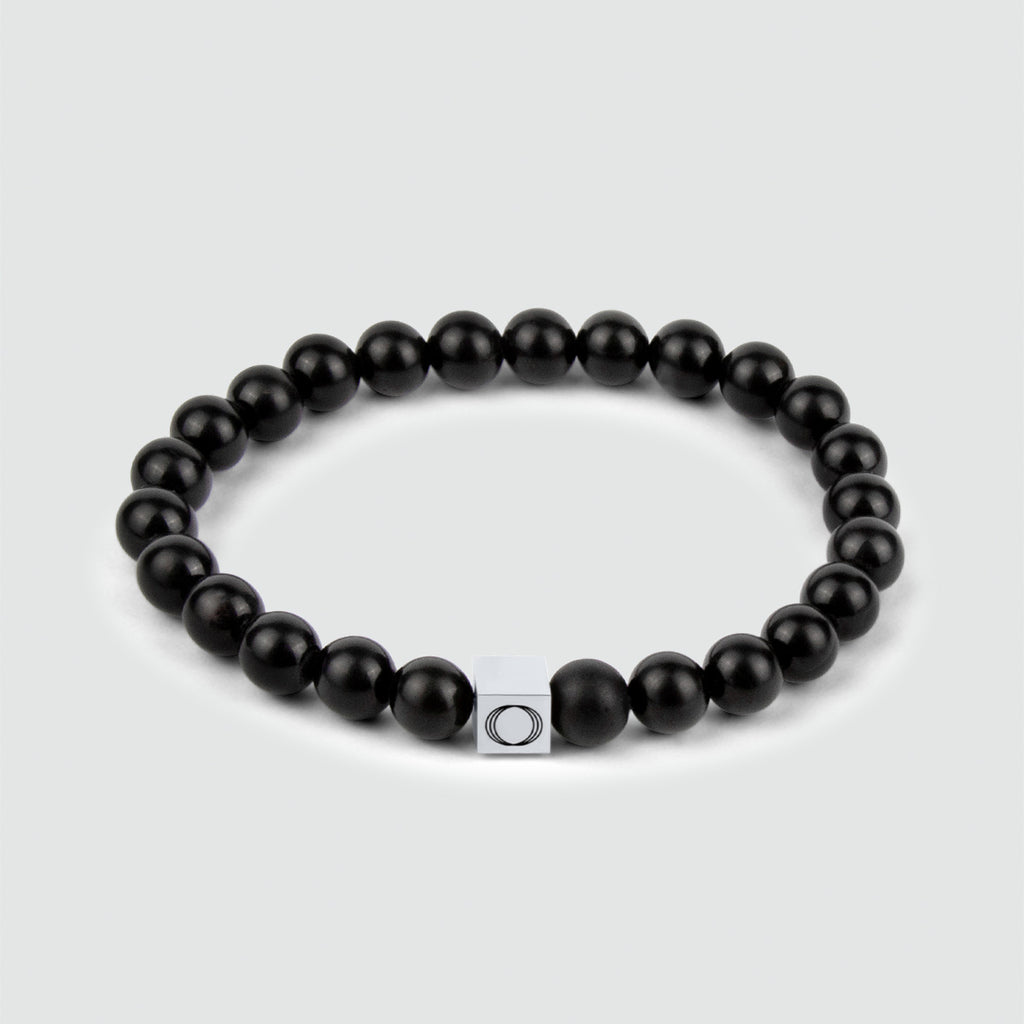Aswad - Bracelet de perles noir mat 6mm avec un poids élégant et une épaisseur fine.