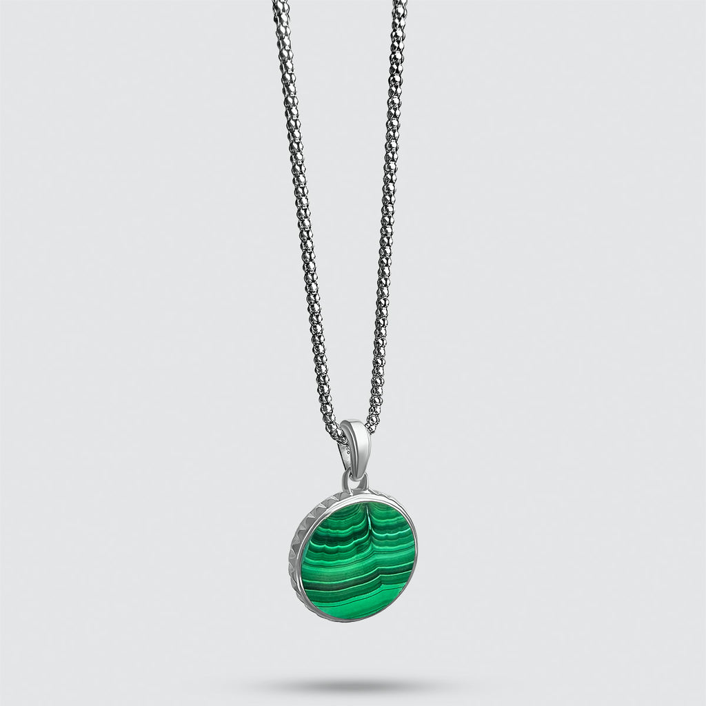 A necklace with a Safar - Sterling Silver Malachite Compass Pendant for men.