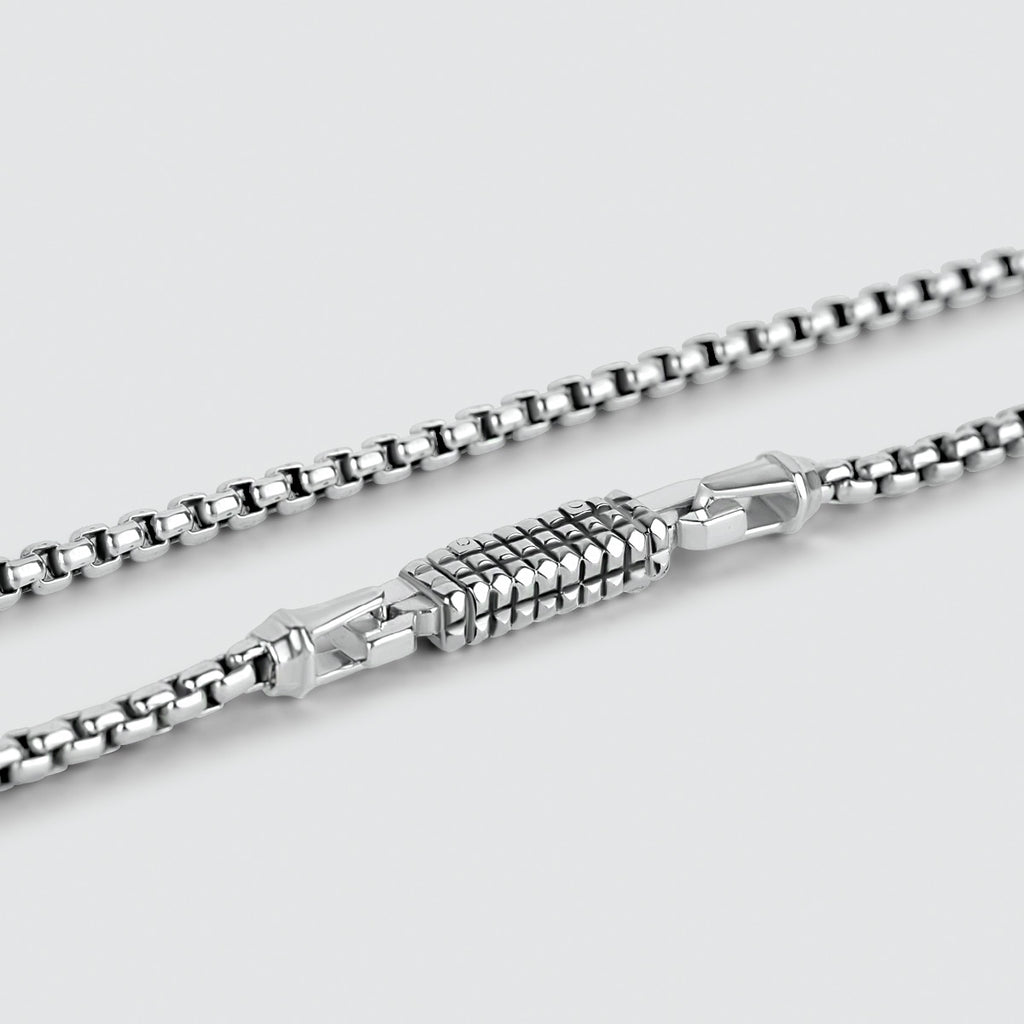 A handmade Kamal - Sterling Silver Box Chain Necklace 3mm with a clasp on it.
