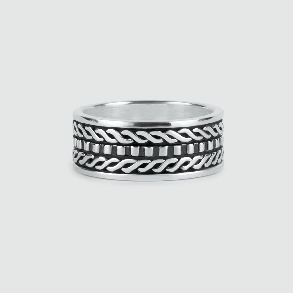 A Fariq - Oxidized Sterling Silver Ring 10mm with black and white designs.