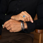Razin - Gevlochten marineblauwe leren armband met sterlingzilver 5,5 mm