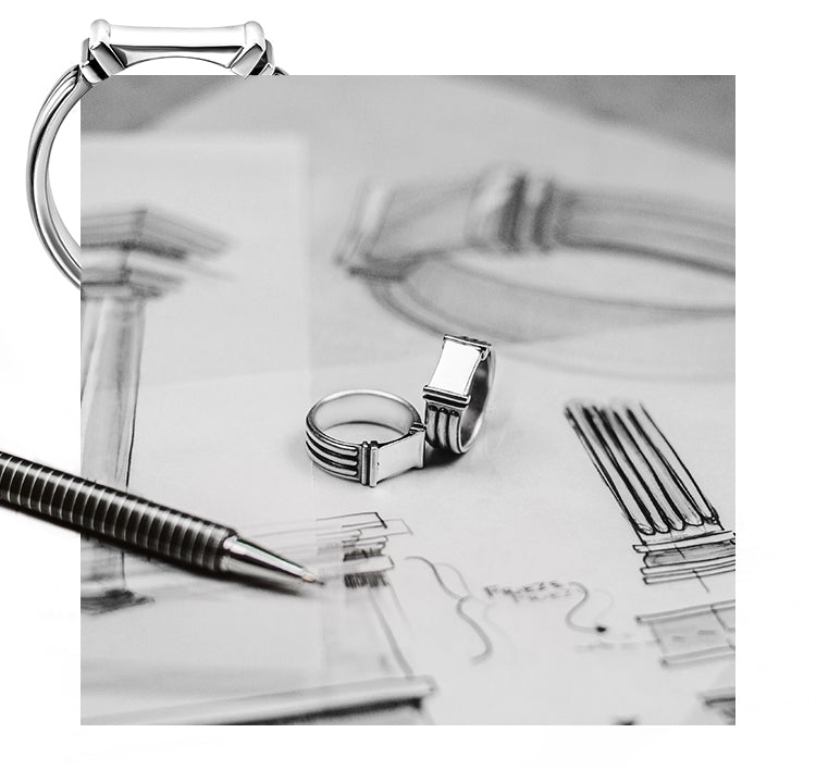 Oxidised rings with 925 sterling silver mens bangles on sketch paper from Ninetwofive. 