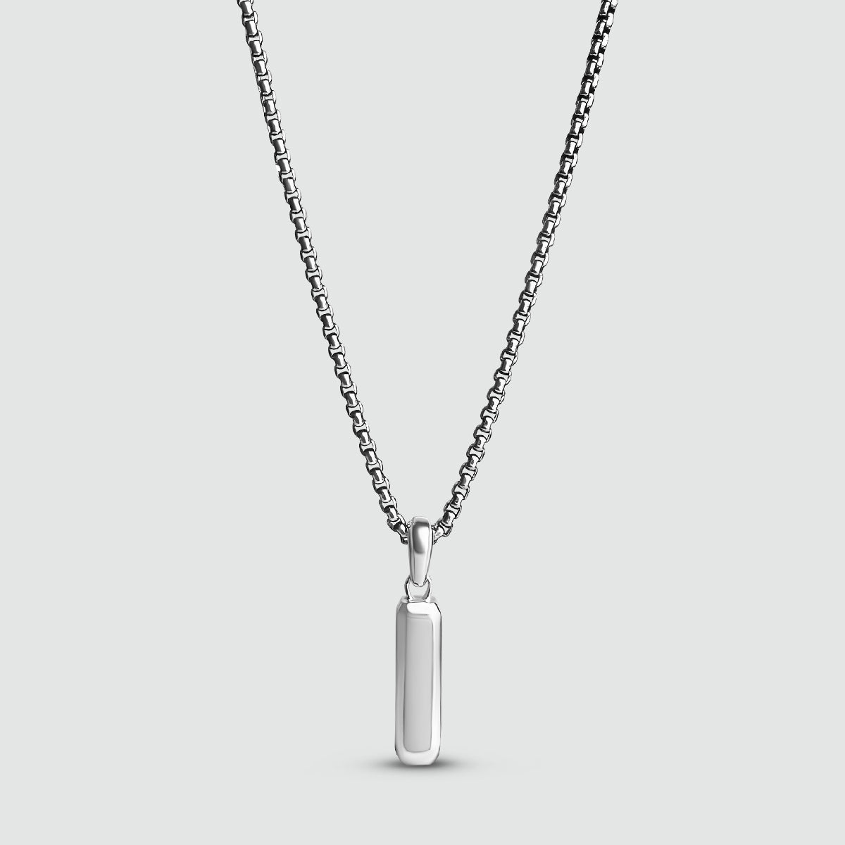 Front view of Jamil sterling silver mens pendant with a box chain from Ninetwofive. 