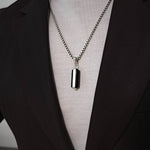 Man wearing samir sterling silver black onyx pendant for men from Ninetwofive.
