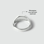 Mens silver signet ring with 'Forever and Always' engraving on a light gray background