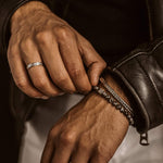 A man wearing a leather jacket.