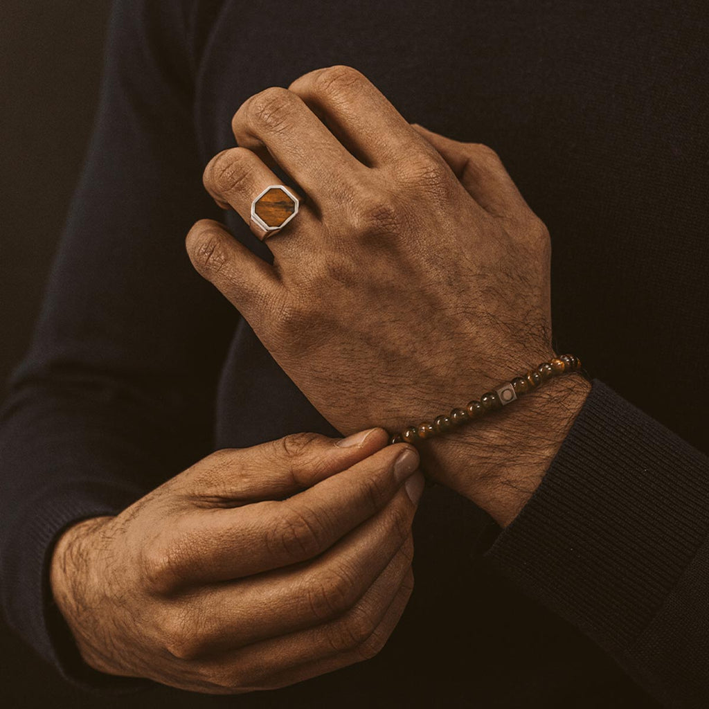 A man wearing a ring.
