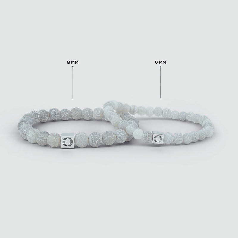 Display of two sizes of the Abyad white beaded mens bracelet, presented side-by-side by Ninetwofive.