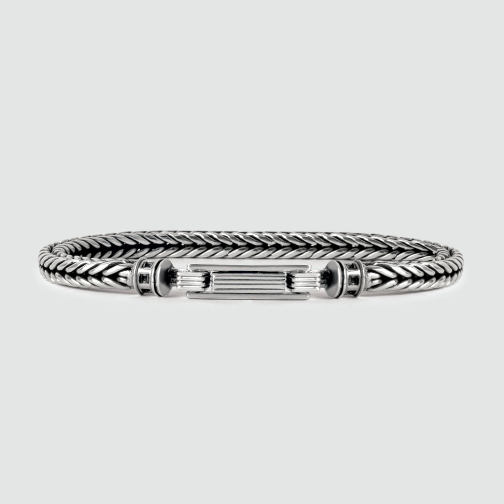 An Adam - Sterling Silver Braided Bracelet 5mm, perfect for men.