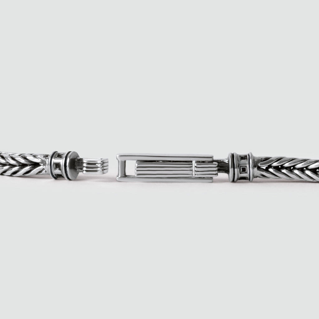 A NineTwoFive men's Adam - Sterling Silver Braided Bracelet 5mm with a secure clasp.