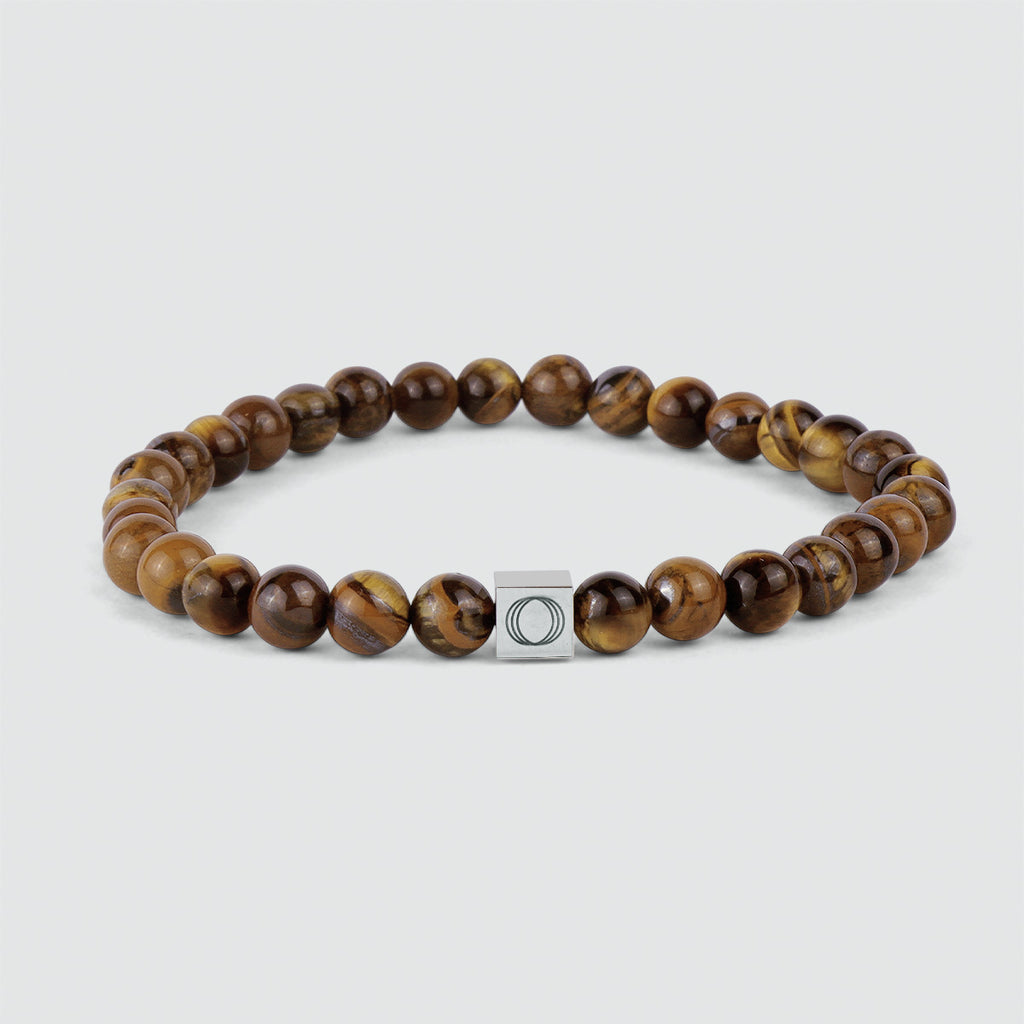 An Alnamr - Tiger Eye Beaded Bracelet 6mm with a silver clasp.