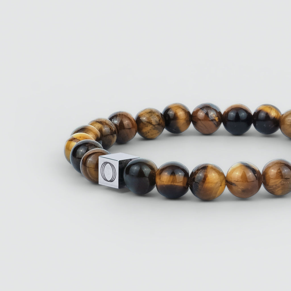Alnamr - Bracelet en perles d'oeil de tigre 8mm avec des perles en pierre d'oeil de tigre et un fermoir en argent. Le bracelet a une épaisseur de 8 mm et pèse 10 gr.