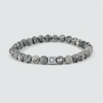 Ein Alrazas - Grey Beaded Bracelet 6mm mit einer grauen Marmorperle und einem silbernen Verschluss.