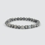 Ein Alrazas - Grey Beaded Bracelet 6mm mit einer grauen Marmorperle und einem silbernen Verschluss.