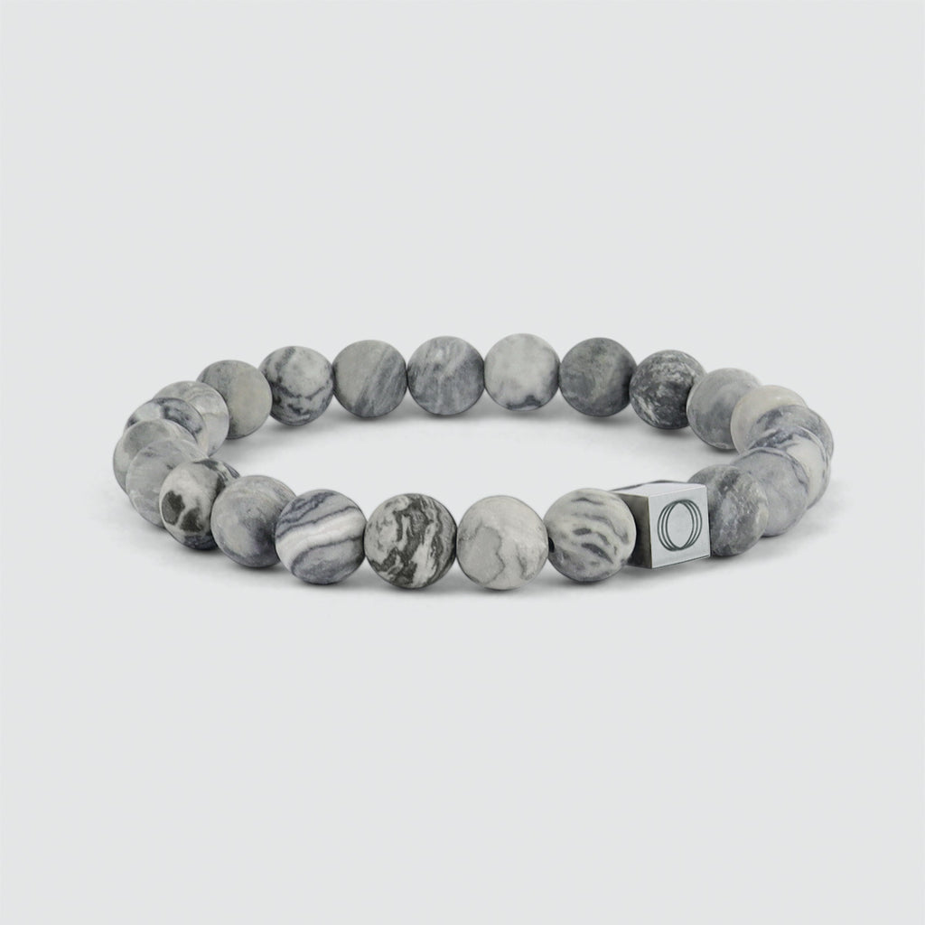 An Alrazas - Grey Beaded Bracelet 8mm adorned with the letter O, weighing 10gr.