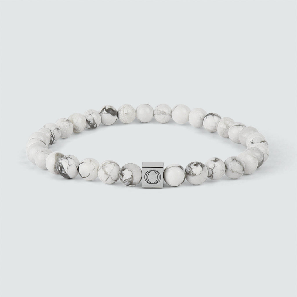 Alrukham - Bracelet en perles blanches de 6mm avec un fermoir carré, pesant 10gr et mesurant 6mm d'épaisseur.