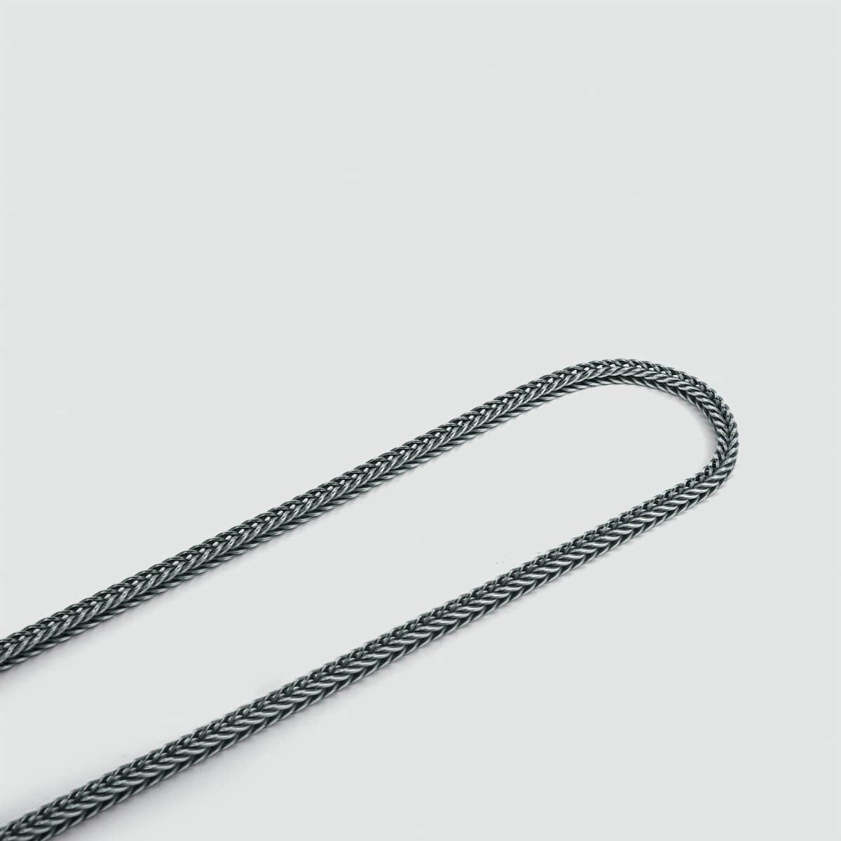 Anis fait main - Blé en argent Collier 3mm avec un nœud, fabriqué en argent 925, sur une surface blanche.