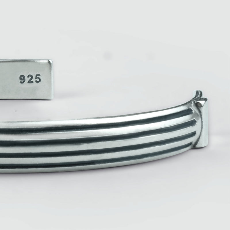 An Arkan - Sterling Silver Bangle Bracelet 8mm with a black and white stripe, perfect as a sterling silver mens bracelet.